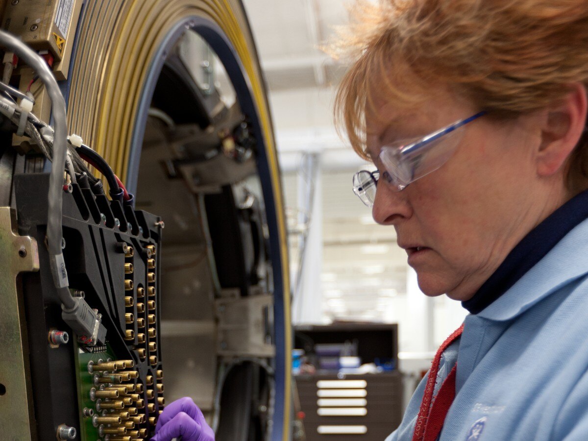 Engineer working on CT system