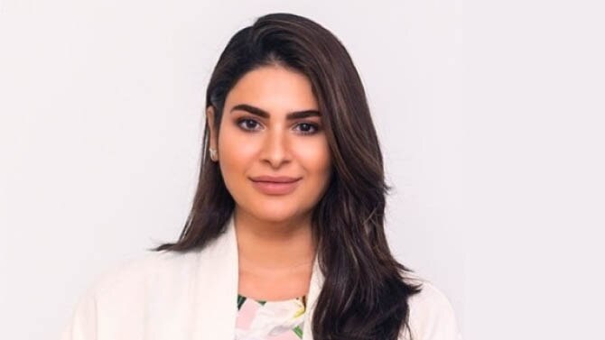 Female medical professional in white coat