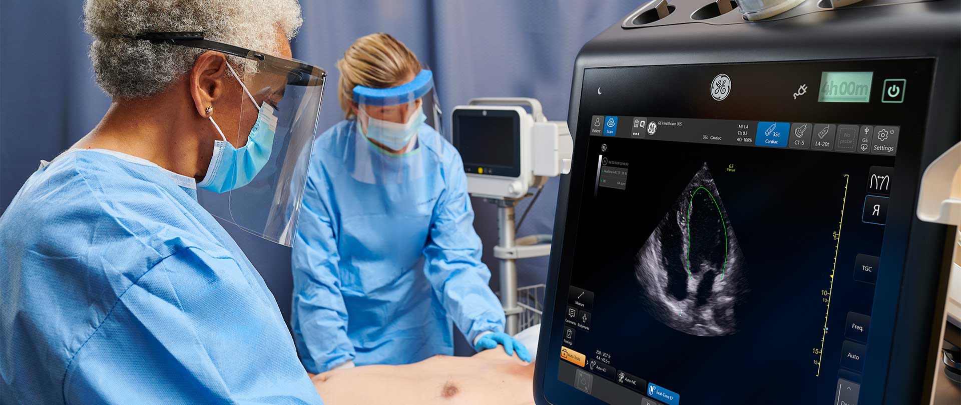 Doctor assessing patient using Venue technology in operating room