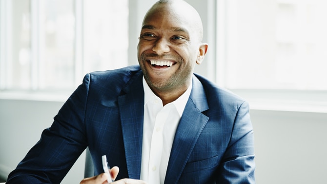 smiling african american man wearing suit